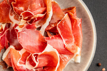 jamon serrano meat appetizer jamon iberico natural product tasty snack fresh delicious gourmet food background on the table rustic top view copy space