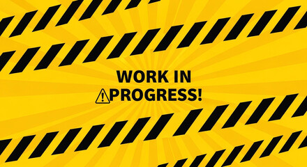 A yellow background with black diagonal stripes and the words work in progress with an exclamation
