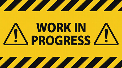 A yellow sign with black stripes and the words work in progress with two exclamation points on each side