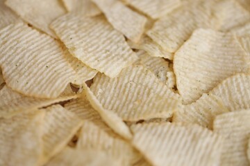 Homemade Flavored Paprika Potato Chips in a Bowl, top view. Flat lay