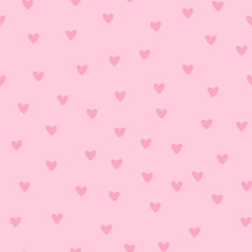 Seamless pattern with gentle small heart on pink background. Ideal for Valentines holiday design, textiles, wrapping