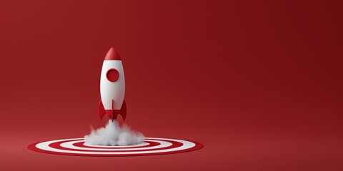 Red and white rocket taking off from target platform on red background