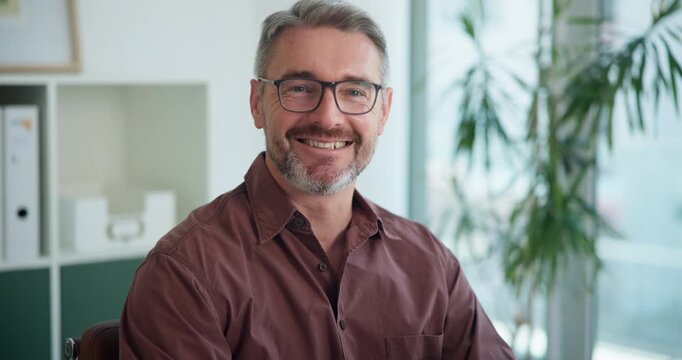 Happy, face and mature businessman in office with confidence for finance career in management. Smile, glasses and portrait of male chief financial officer with pride for company in workplace.
