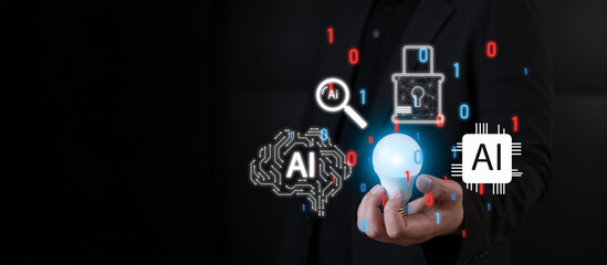 AI, cybersecurity, and innovation concept. Businessman hand holding a lightbulb icon with a virtual interface showing AI brains, chips, and security padlocks for data protection on a dark background.