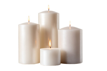 Three elegant, cylindrical candles in varying sizes, emitting warm light