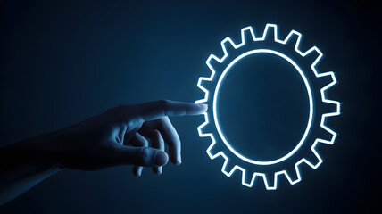 Hand touching a glowing digital gear icon, representing settings, innovation, and industry.