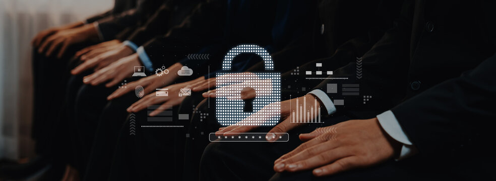 Business professionals focus on cybersecurity issues at a seminar, with a digital padlock symbolizing security and data protection in the corporate environment. Trope