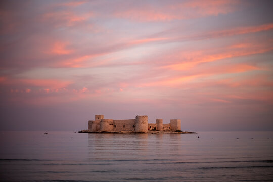 The impressive view of Maiden's Castle at sunset. The famous historical Maiden's Castle in the Erdemli district of Mersin, Turkey. Known as Kız Kalesi in Turkish.