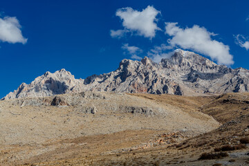 Demirkazık Peak in Niğde Province. Autumn in the Aladağlar Mountains. One of Türkiye's most famous and popular mountain ranges for outdoor sports and mountaineering.