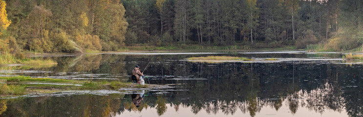 Man is fishing in a lake