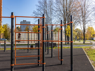 Park with a playground and a bench