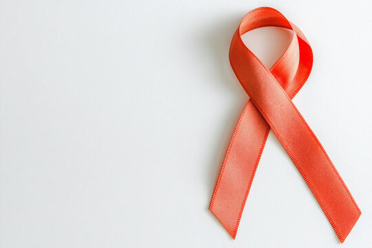 Generative AI image of red ribbon symbol representing World AIDS Day awareness campaign, donor day