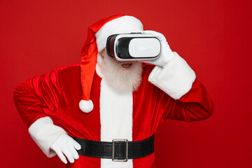 Profile side view portrait of his he bearded fat overweight Santa wear vr helmet gadget device...