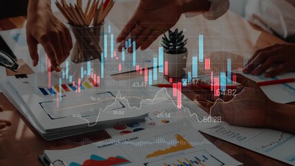 A diverse team engages in financial analysis, reviewing charts and data reports in a modern office. The collaboration aims to enhance strategic decision-making and performance. Raster - Powered by Adobe