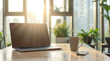 Clean modern office desk with laptop, coffee cup, and minimal tech accessories, concept of productivity and digital business