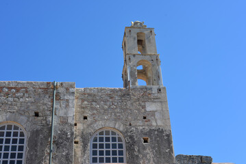 Exterior view of the historic Byzantine-era St. Nicholas Church ,Noel Baba Church, with its stone walls and bell tower, located in Demre, Antalya, Turkey.
