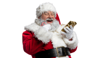 Santa claus in a red suit with a white beard happily holding a gift while enjoying a candy cane, ready for compositing