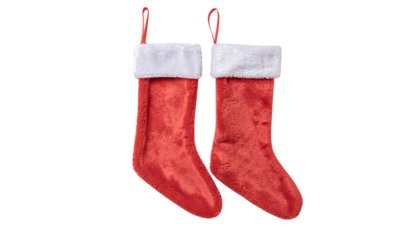Two red christmas stockings with white cuffs hanging side by side on a white background png with transparency