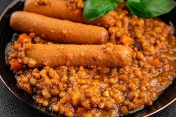 Sausage with lentils second course tasty snack fresh delicious gourmet food background on the table rustic top view copy space