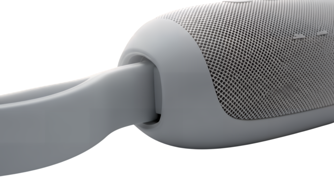 Close-up detailed view of a sleek gray portable audio speaker with a textured grille and durable carrying strap, expertly isolated on transparent background for professional product display