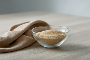 minimalist glass bowl filled with grains sits elegantly on wooden surface