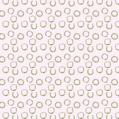 Elegant seamless Christmas pattern with hand-drawn watercolor wreaths and holly leaves arranged in a soft repeating grid on a pale pink background.