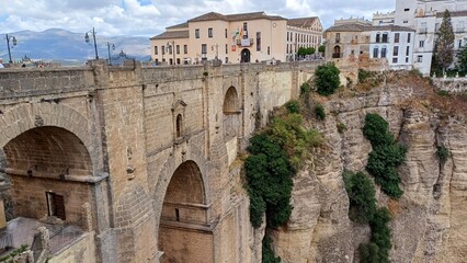 Close view of Puente Nuevo bridge and the gorge in Ronda, Spain