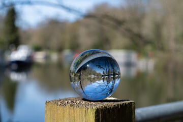 River Medway between Maidstone and Allington Lock in Kent, England shot through a lens / crystal ball
