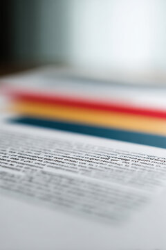 contract lies on table featuring augmented reality conditions with blurred white text bars