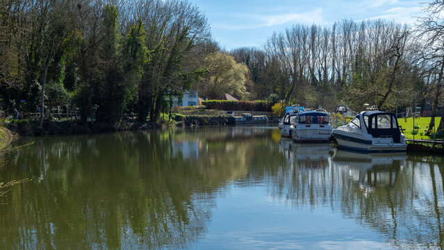 Boats on the river Medway between Maidstone and Allington Lock in Kent, England