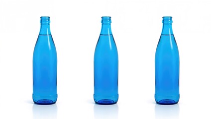 Naklejka premium Three blue glass bottles lined up against a white background.