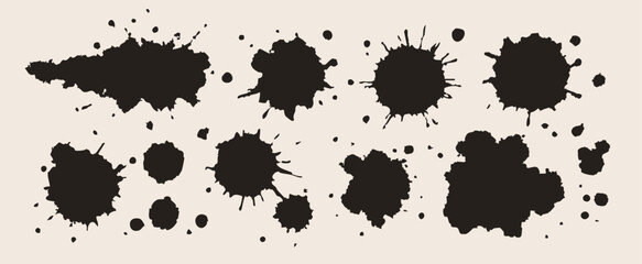 Black Ink splatter set. Liquid stains, burst, spots, drops, dots. Paint splashes. Hand drawn trendy Vector illustration. Isolated design elements