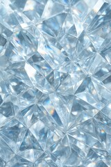 An abstract close-up of faceted crystal glass shows a geometric mosaic design.