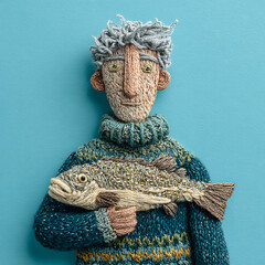 Embroidery Art of Fisherman Holding Fish