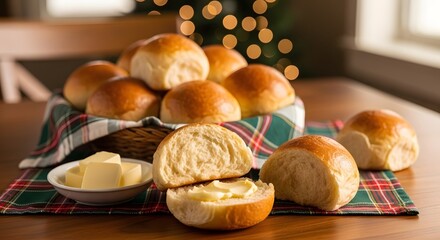 Freshly baked dinner rolls served with butter on a festive table