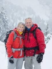 portrait of senior couple hikers standing in snowcovered winter nature no logos no brands ar 34