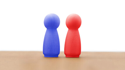 Red and blue wooden figures symbolizing U.S. elections between Democrats and Republicans