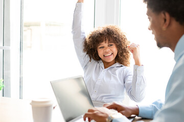 business man and woman in the office with expressions of success and achievement
