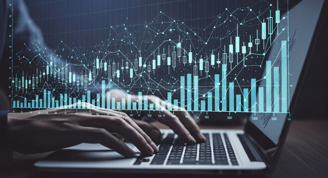 Person typing on laptop with glowing stock market graph