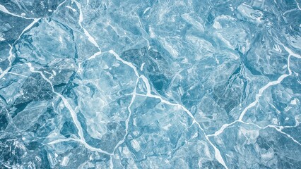 Obraz premium Aerial view of ice with white cracks and textures used as a background. Nature and ice, concept. Cold environment and frozen water. The concept of winter and climate.