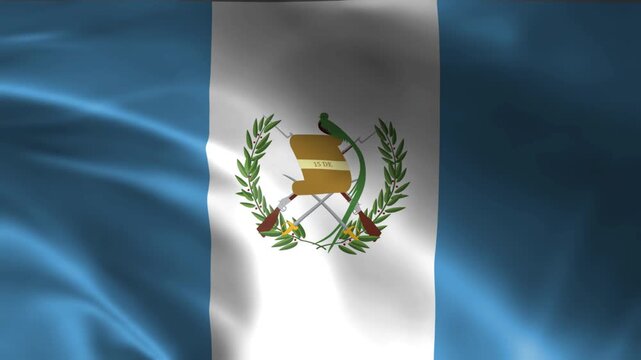 realistic waving flag of guatemala with national emblem and blue white vertical stripes in close up view
