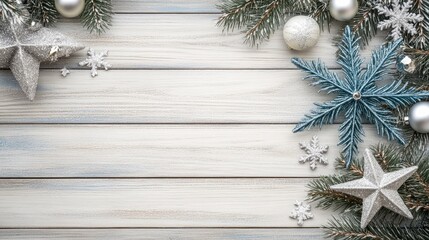 The aqua blue snowflake and silver star create a charming holiday decoration against a rustic wooden backdrop