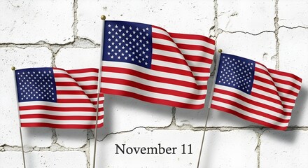 Three american flags are displayed against a white brick wall to commemorate veterans day on november 11th, honoring military veterans and their service