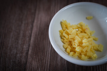 Chopped Ginger Pieces on Clean Surface Highlighting Culinary and Health Concept