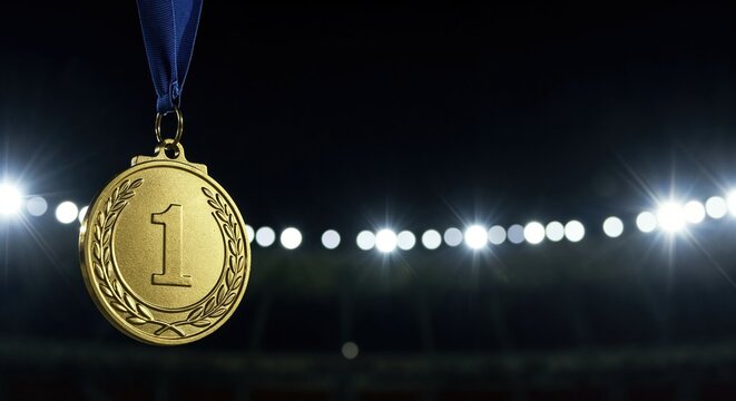 A prestigious gold first-place medal, adorned with a laurel wreath and a prominent number one, dangles from a blue ribbon before a blurred night stadium with brilliant spotlights. - Powered by Adobe