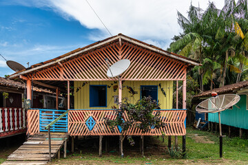 Colorful natural-framed houses with balconies at Pesqueiro, Soure in Marajo Island, Brazil.