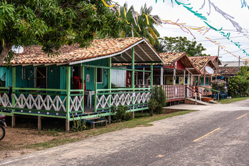 Colorful natural-framed houses with balconies at Pesqueiro, Soure in Marajo Island, Brazil.