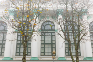 Storytelling image of Chisinau city in the Republic of Moldova on a calm autumn morning, wrapped in fog and warm sunrise light highlighting the charm of the capital.