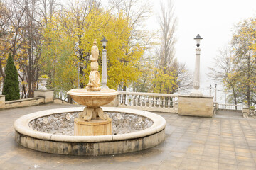 Storytelling image of Chisinau city in the Republic of Moldova on a calm autumn morning, wrapped in fog and warm sunrise light highlighting the charm of the capital.