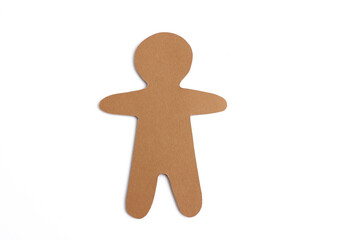 Blank brown gingerbread man shape cut from cardboards isolated on white background